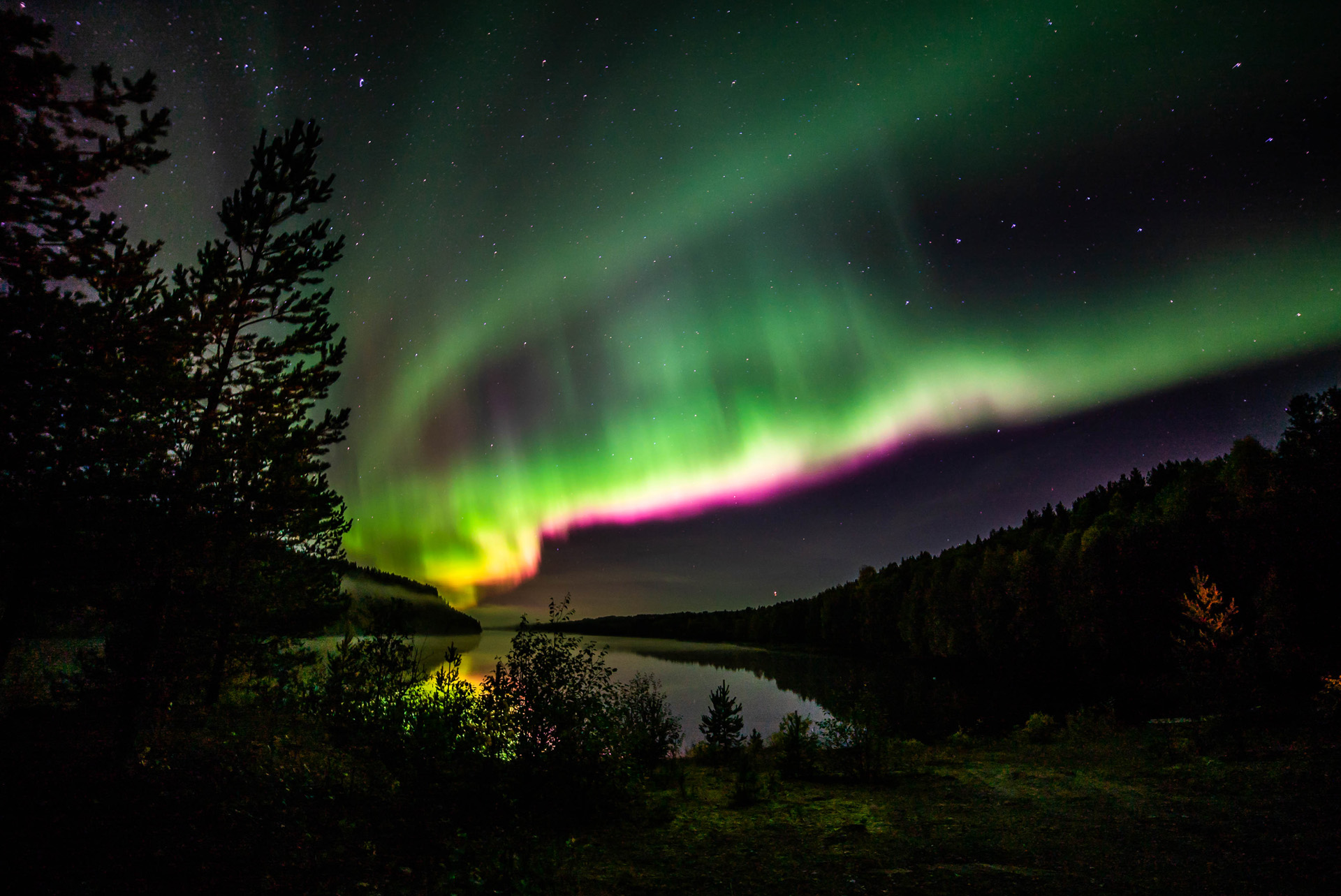 Red Auroras Over the River