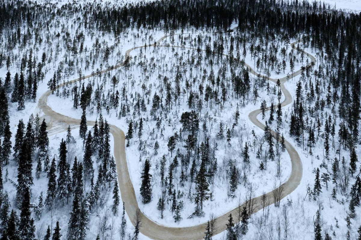 Aerial view of the forest ice skating trail in Levi