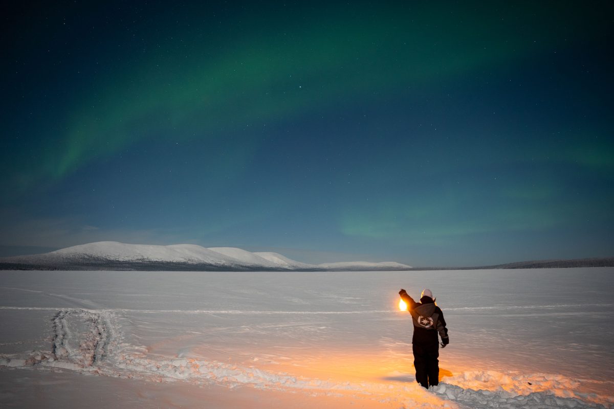 Aurora hunting by lantern light in Levi