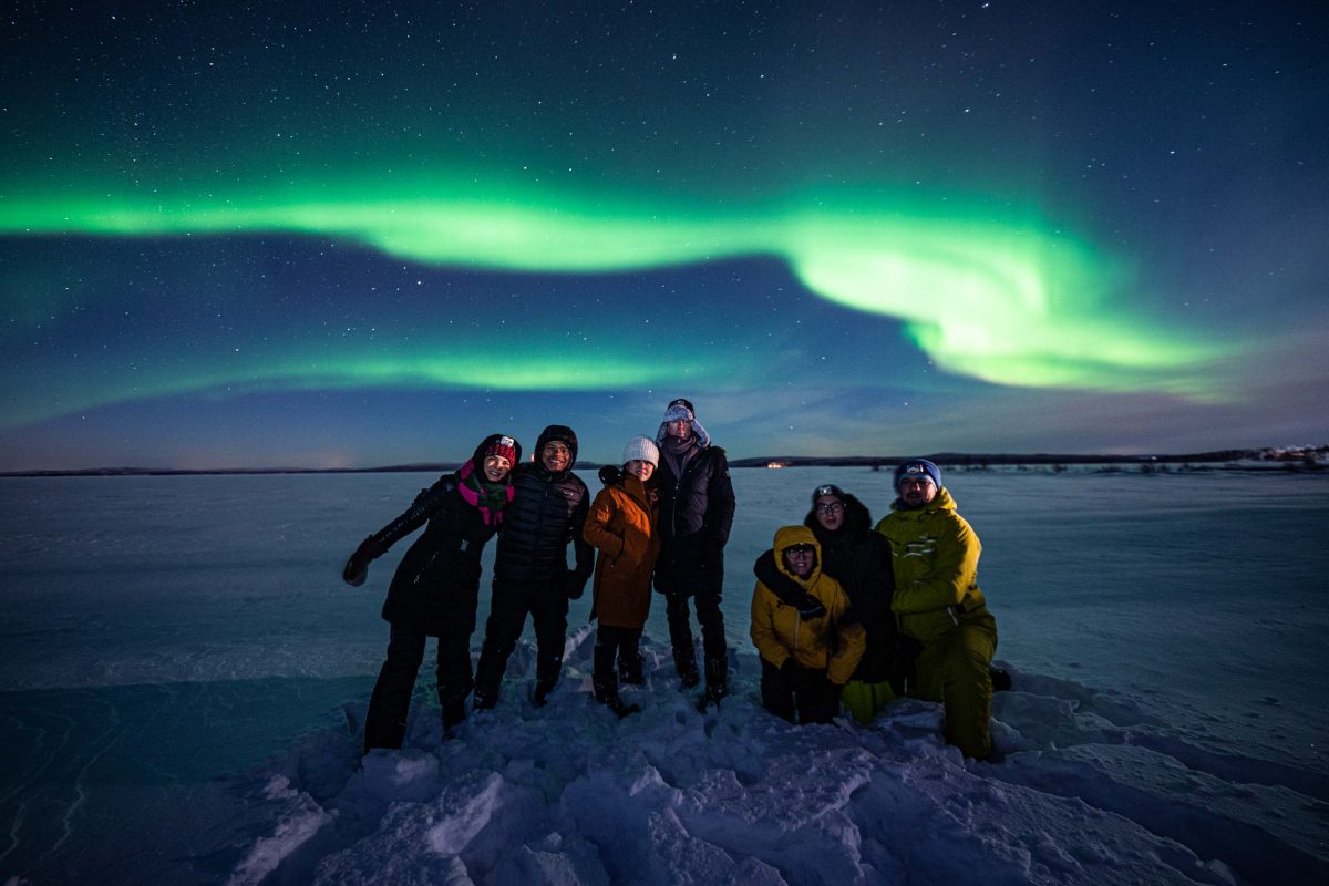 Beyond Arctic team beneath the Northern Lights