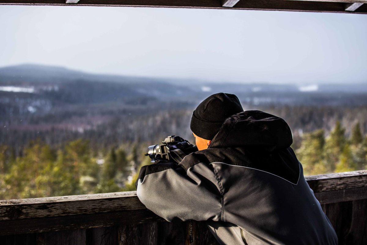 Guest photographing the winter forest