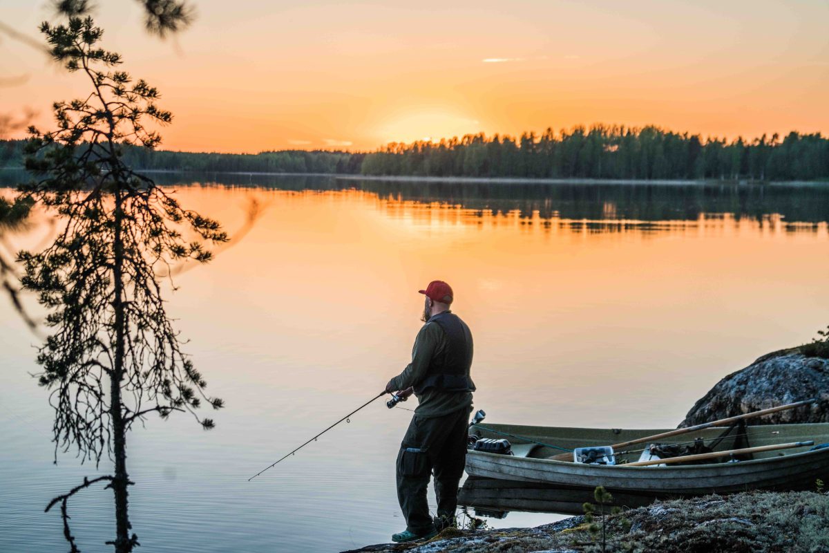 Fishing beside a lake near Rovaniemi, Lapland