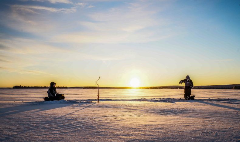 Ice Fishing on a Frozen Lake