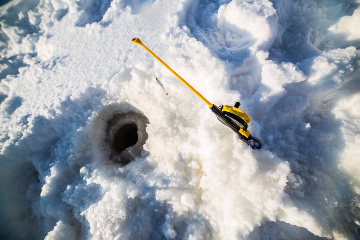 Ice fishing equipment on a frozen lake