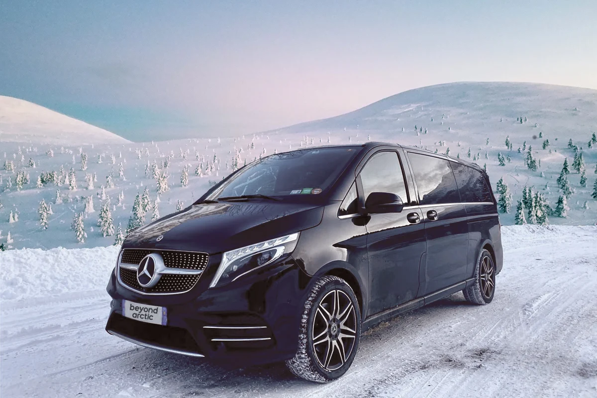 Beyond Arctic Mercedes-Benz minivan in a snowy fell landscape