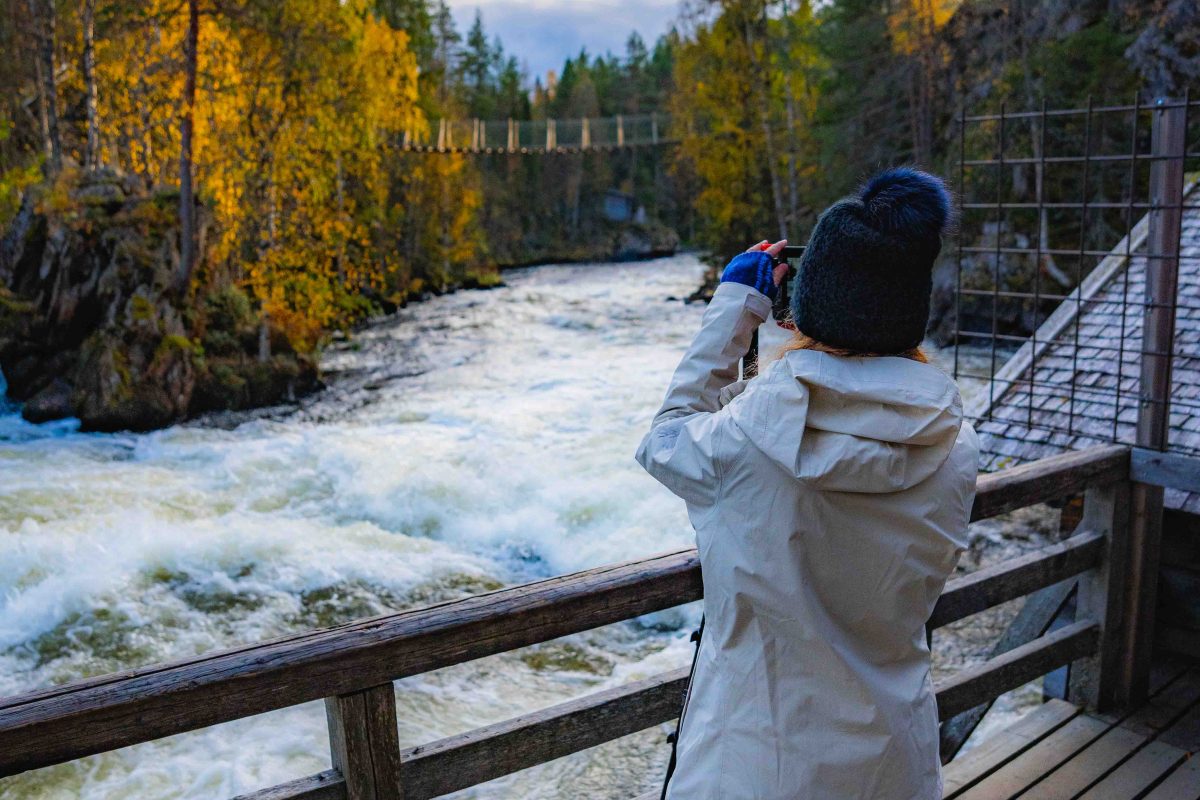 Photographing the river in Oulanka National Park, Lapland, Finland