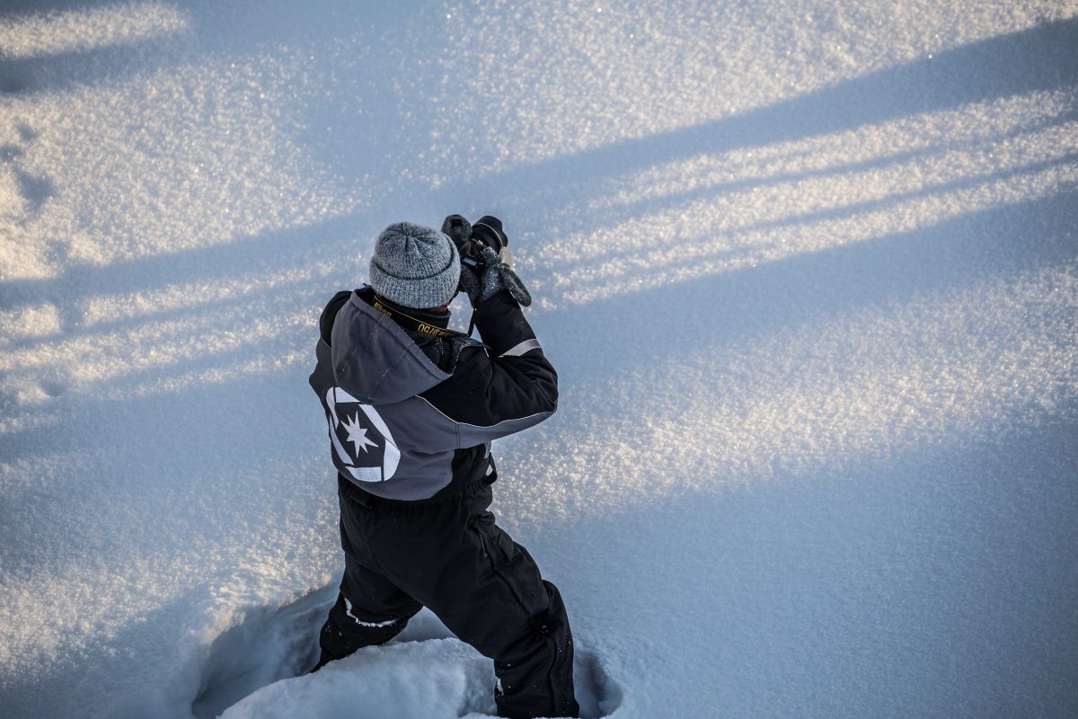 Photographer in the Rovaniemi wilderness